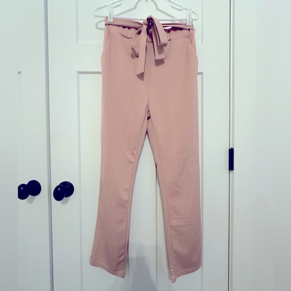 SHEIN light pink pants with tie belt. Size Medium
NWOT